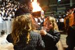 Light and dancing around Lag Ba&#39;Omer bonfire