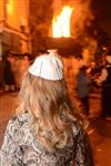 Light and dancing around Lag Ba&#39;Omer bonfire