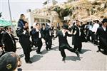 Light and dancing around Lag Ba&#39;Omer bonfire