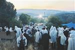 Light and dancing around Lag Ba&#39;Omer bonfire in the grave of Rabbi Shimon Bar Yochai in Meron in the Galilee