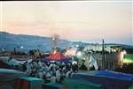 Light and dancing around Lag Ba&#39;Omer bonfire in the grave of Rabbi Shimon Bar Yochai in Meron in the Galilee