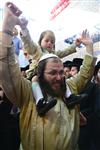 Light and dancing around Lag Ba&#39;Omer bonfire in the grave of Rabbi Shimon Bar Yochai in Meron in the Galilee