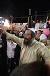 Light and dancing around Lag Ba&#39;Omer bonfire