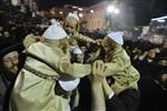 Light and dancing around Lag Ba&#39;Omer bonfire