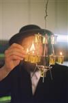 Light oil plates of the festivities in honor of Rabbi Shimon Bar Yochai on Lag B&#39;Omer