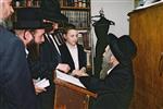 Rabbi Aharon Leib Steinman getting an audience at home