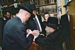 Rabbi Aharon Leib Steinman getting an audience at home