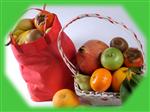 bag and basket full of fruit with a green border