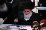 Holding sefer Torah