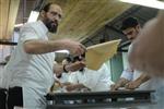 Unleavened bread are baked in a special oven to be kosher for Passover