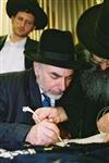 Buying a Sefer Torah with joy and dancing and mitzvah meal