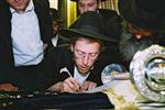 Buying a Sefer Torah with joy and dancing and mitzvah meal