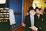 Buying a Sefer Torah with joy and dancing and mitzvah meal