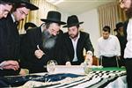 Buying a Sefer Torah with joy and dancing and mitzvah meal