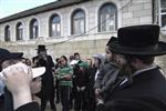 The grave of Rabbi Shimon Bar Yochai in Meron - Jew sings and plays the boy celebrating chalake with his parents.