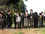 The Rebbe and Chassidim do Tashlich for the Day of Atonement