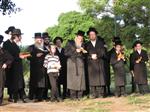The Rebbe and Chassidim do Tashlich for the Day of Atonement