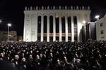 The Rebbe and Chassidim do Tashlich for the Day of Atonement