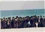 The Rebbe and Chassidim do Tashlich for the Day of Atonement