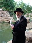 The Rebbe and Chassidim do Tashlich for the Day of Atonement