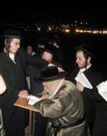 The Rebbe and Chassidim do Tashlich for the Day of Atonement