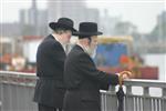 The Rebbe and Chassidim do Tashlich for the Day of Atonement