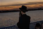 The Rebbe and Chassidim do Tashlich for the Day of Atonement