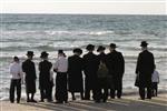 The Rebbe and Chassidim do Tashlich for the Day of Atonement