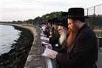 The Rebbe and Chassidim do Tashlich for the Day of Atonement