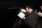 The Rebbe and Chassidim do Tashlich for the Day of Atonement