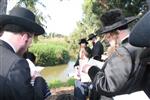 The Rebbe and Chassidim do Tashlich for the Day of Atonement