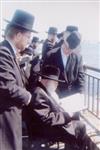 The Rebbe and Chassidim do Tashlich for the Day of Atonement